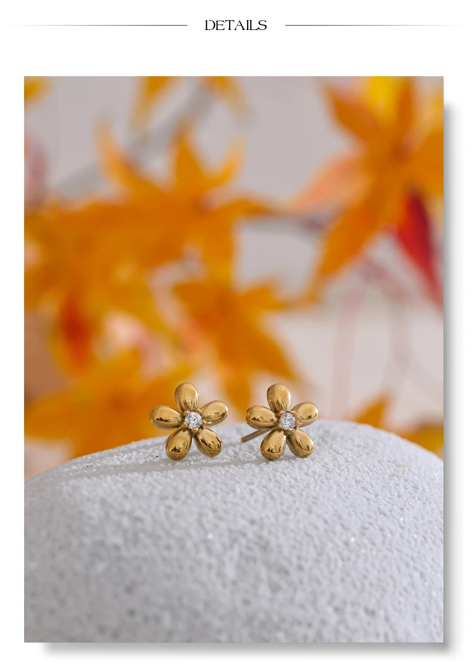 Cubic zirconia flower earrings in gold-plated stainless steel with cubic zirconia.