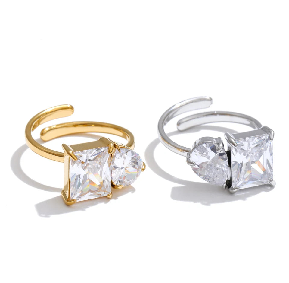 Cubic zirconia geometric ring in 18K gold-plated stainless steel with cubic zirconia.