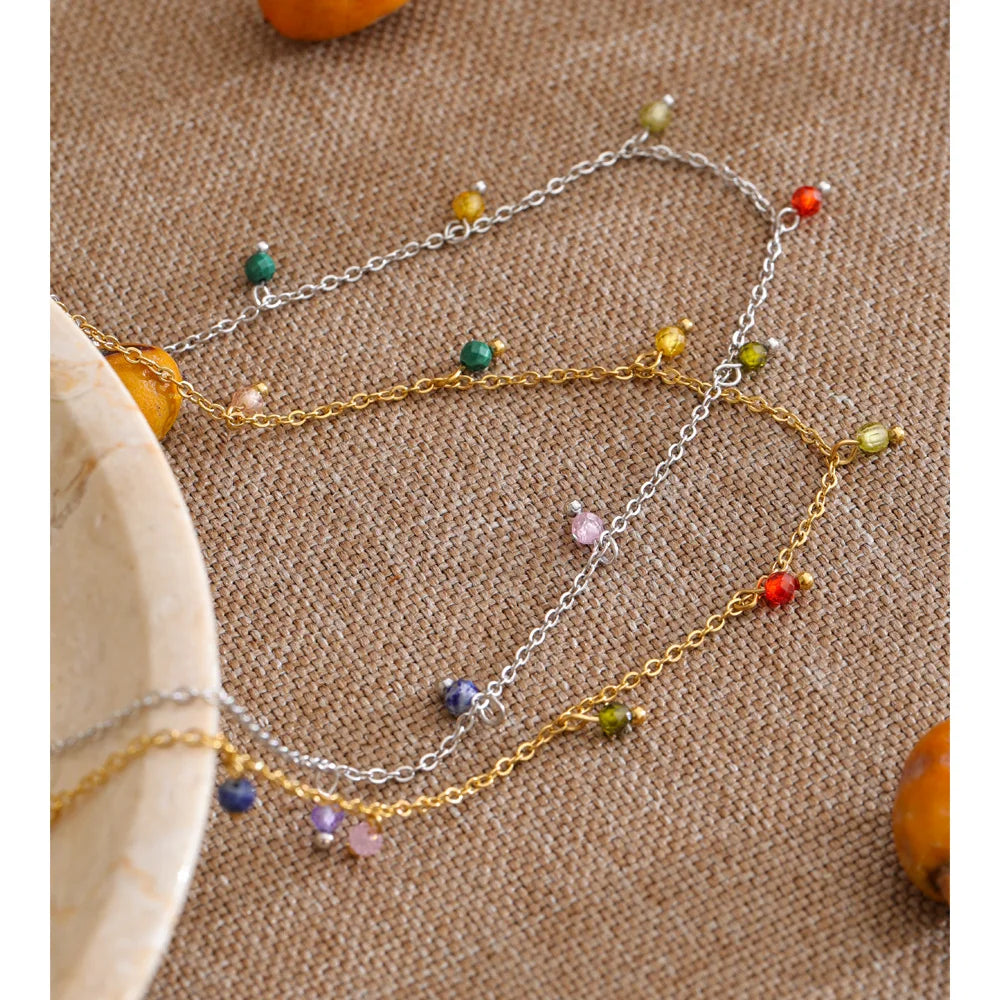 Cubic zirconia multi-color geometric necklace in gold-plated stainless steel with cubic zirconia.
