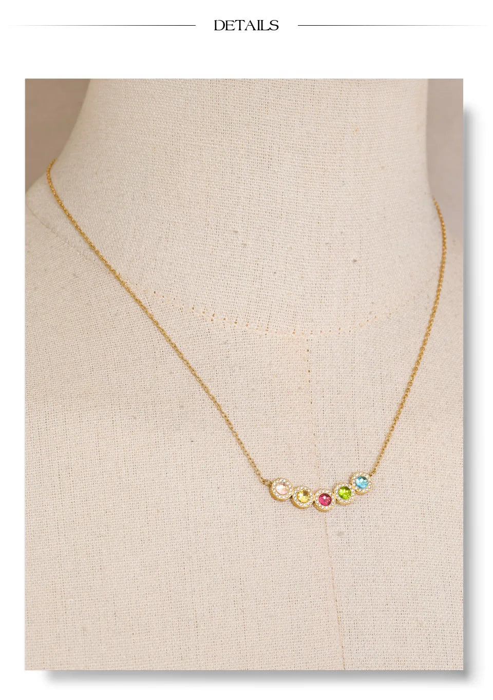 Cubic zirconia multi-color geometric necklace in gold-plated stainless steel with cubic zirconia.