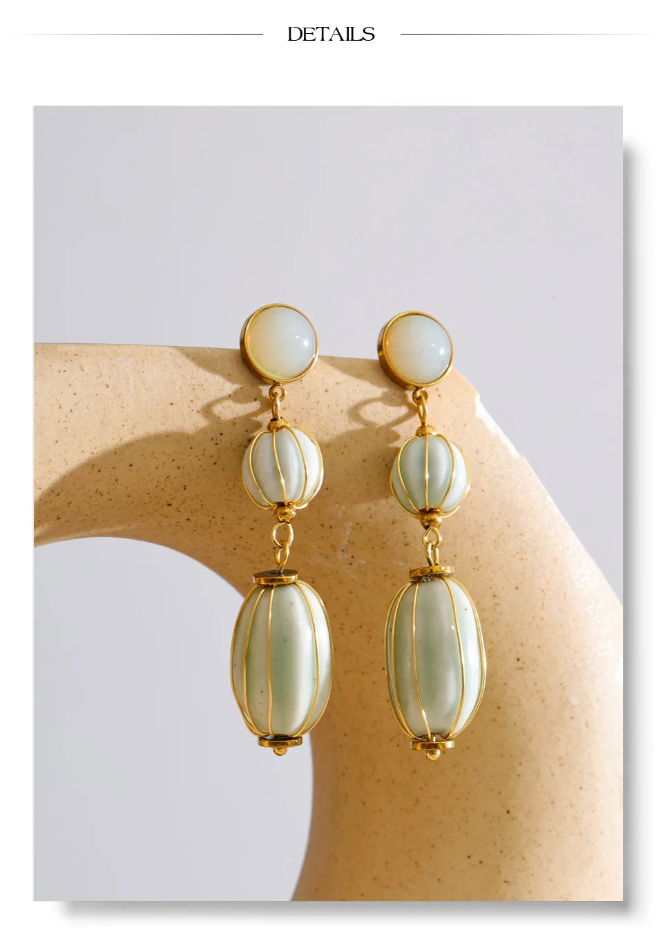 Beaded geometric earrings in gold-plated stainless steel.