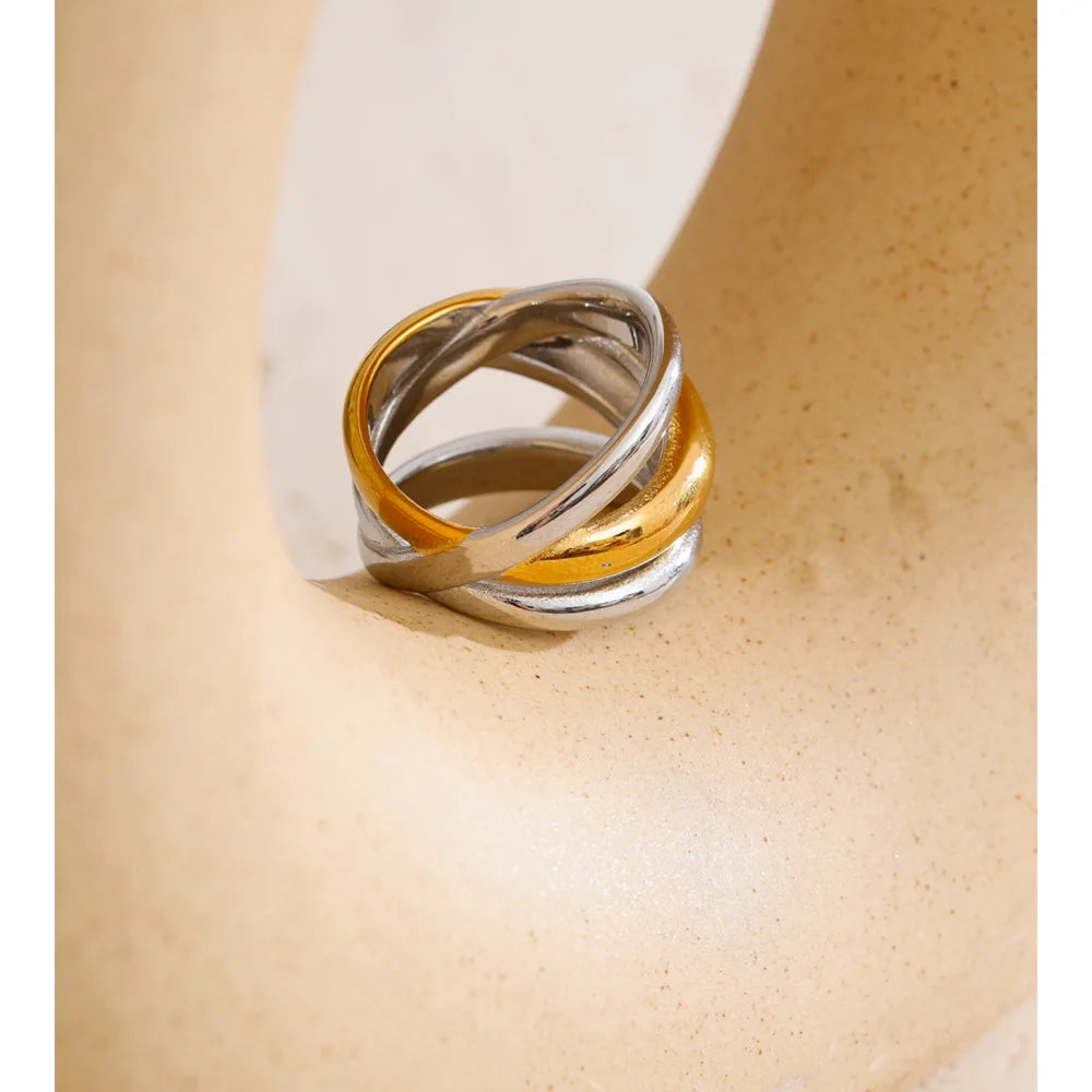 Geometric layered ring in 18K gold-plated stainless steel.