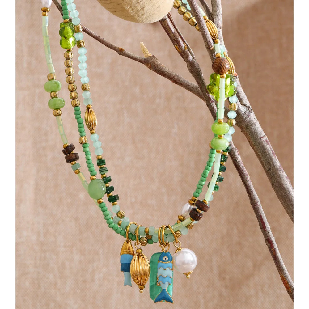 Pearl crystal geometric necklace in gold-plated stainless steel with pearl and crystal.