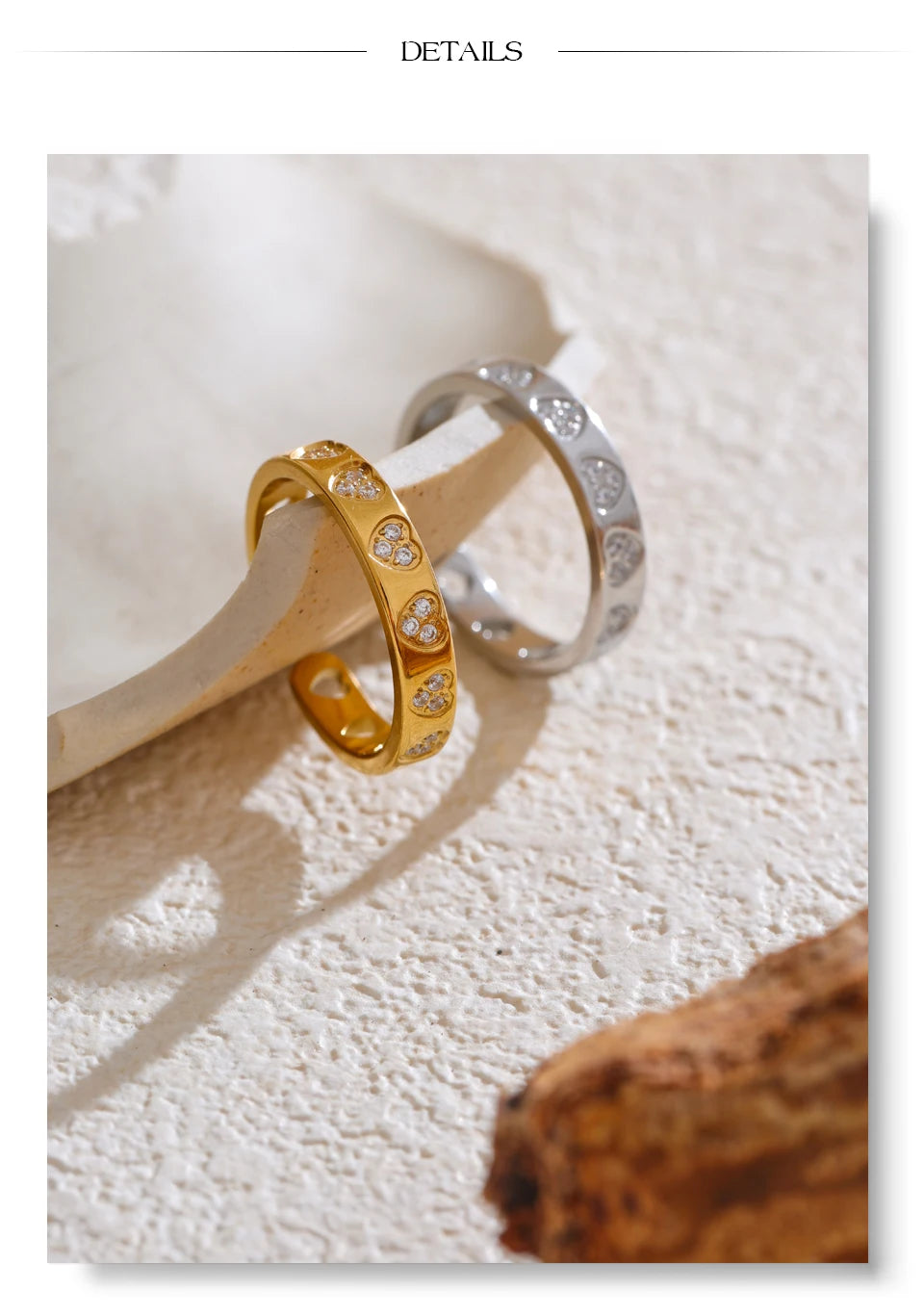 Cubic zirconia heart ring in gold-plated stainless steel with cubic zirconia.