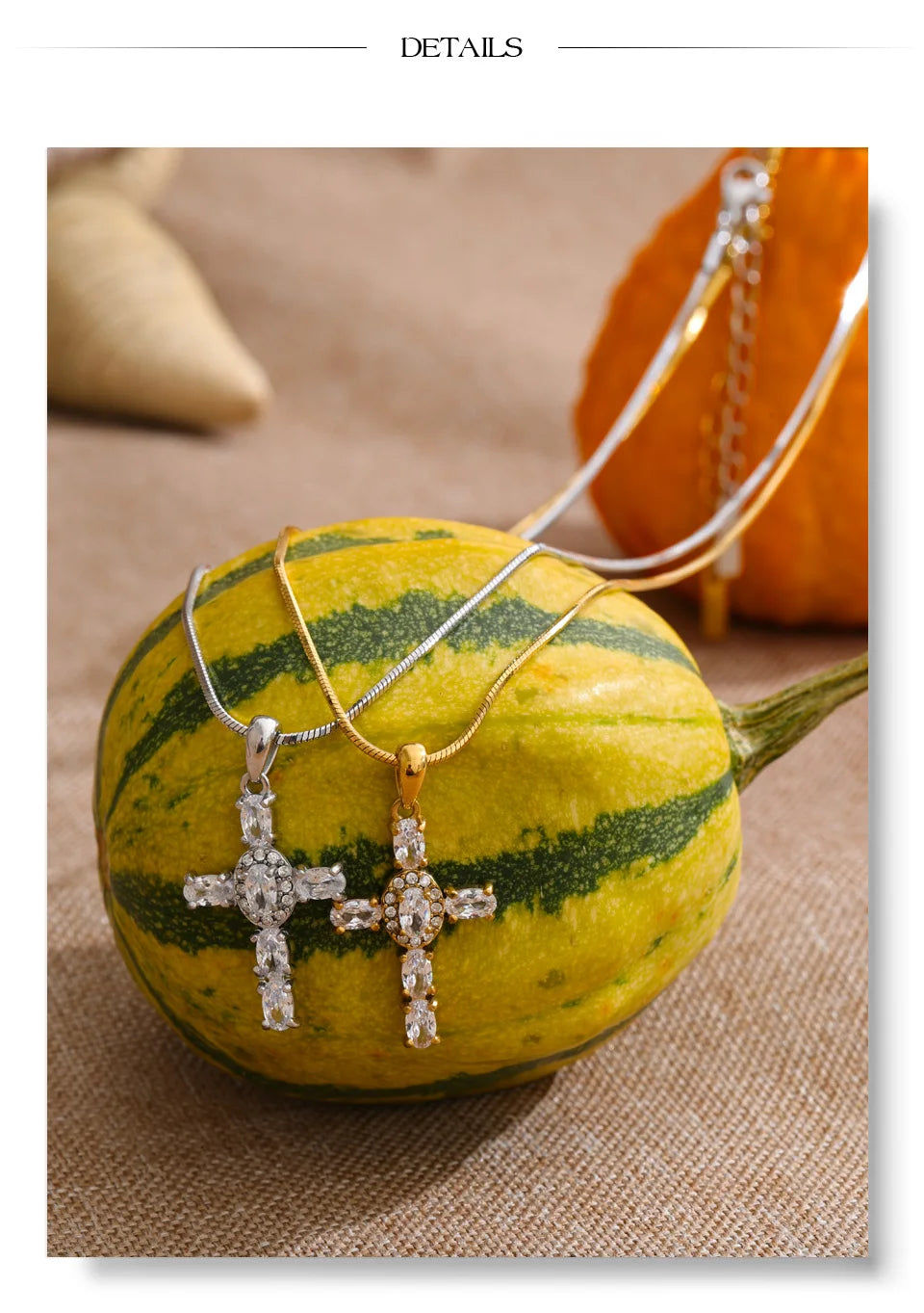 Cubic zirconia cross necklace in gold-plated stainless steel with cubic zirconia.
