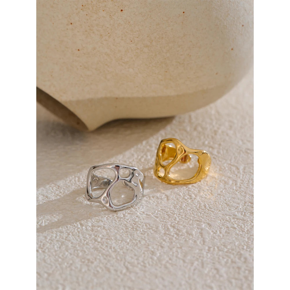 Geometric ring in gold-plated stainless steel.