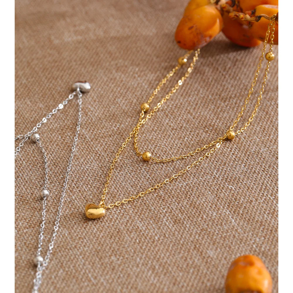 Heart chain necklace in gold-plated stainless steel.