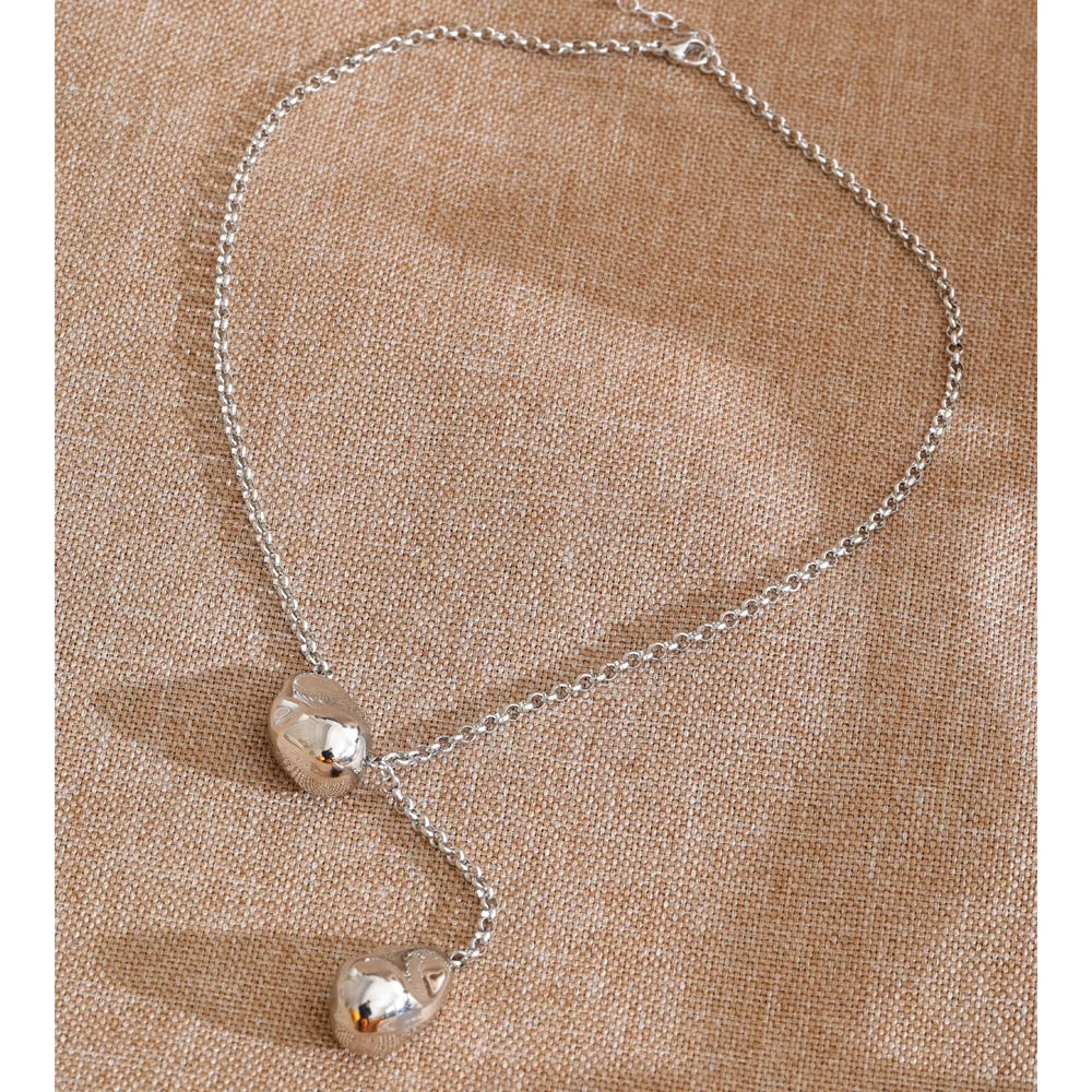 Geometric necklace in gold-plated stainless steel.