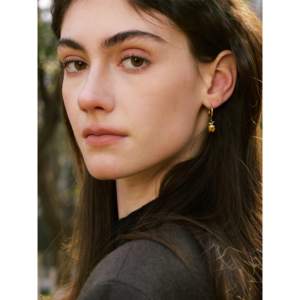 Geometric earrings in gold-plated stainless steel.
