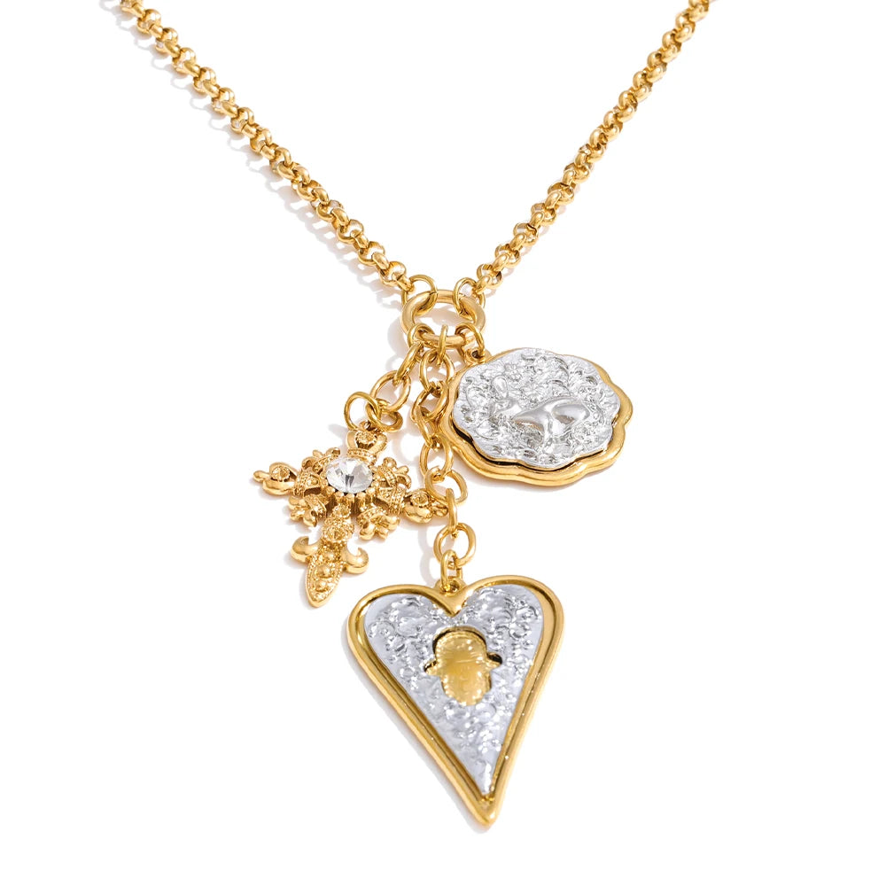 Heart cross necklace in gold-plated stainless steel.