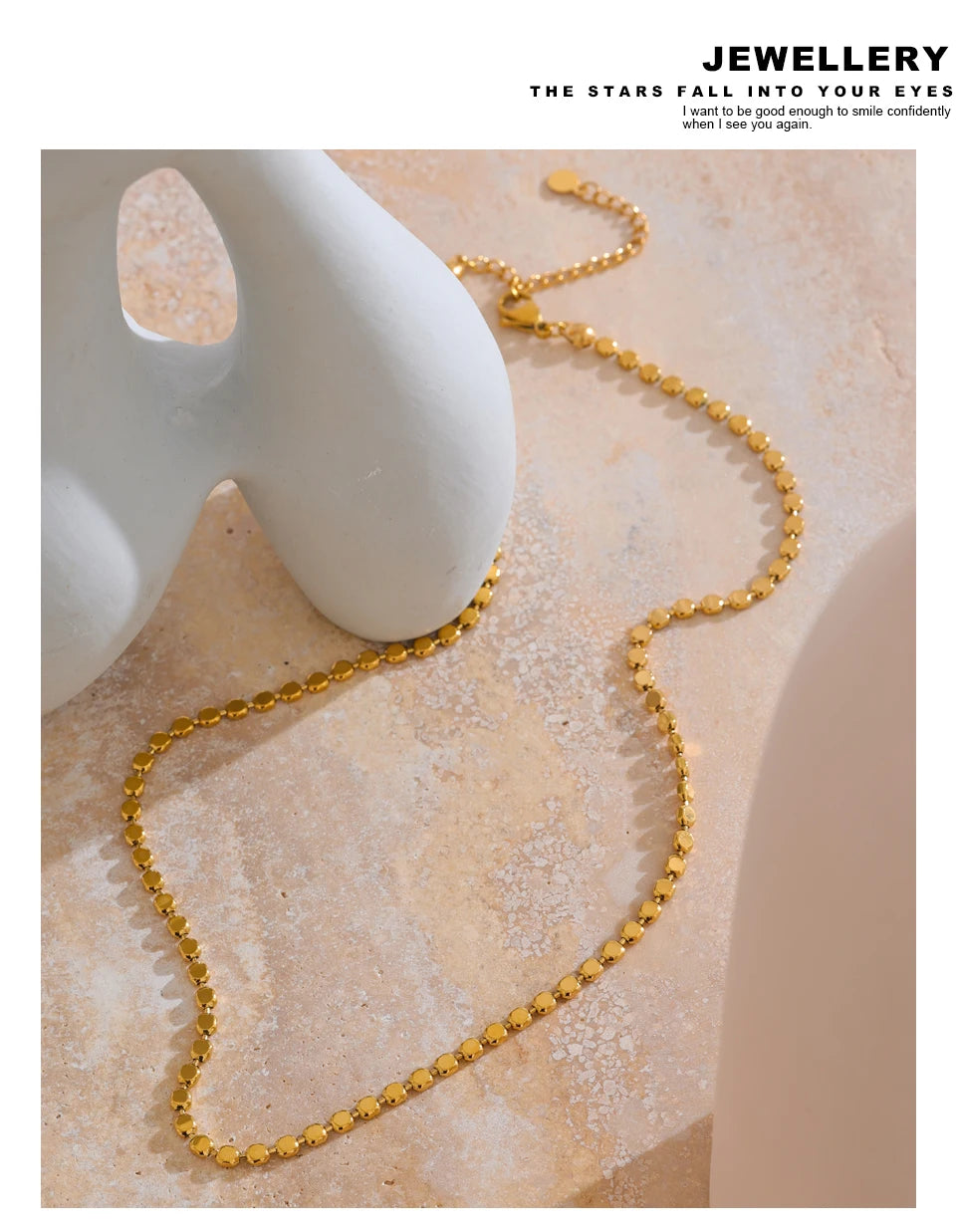 Geometric chain necklace in gold-plated stainless steel.