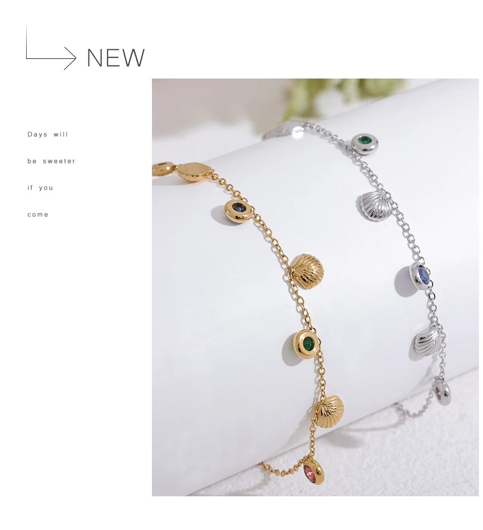 Cubic zirconia shell multi-color anklet in gold-plated stainless steel with cubic zirconia and shell.