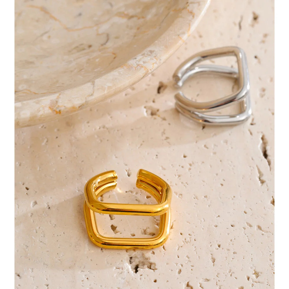 Geometric ring in 18K gold-plated stainless steel.