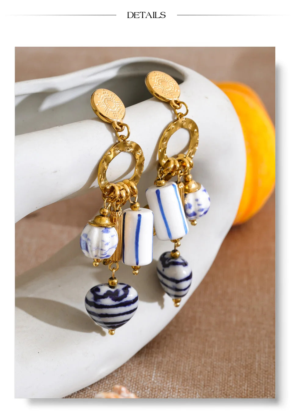 Blue heart flower earrings in gold-plated stainless steel.