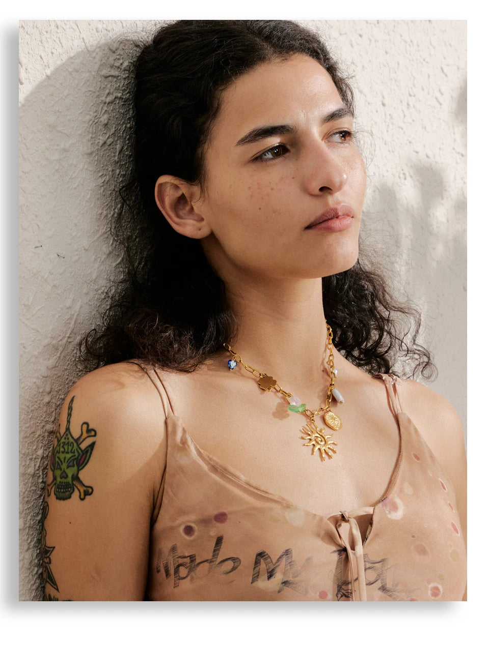 Sun geometric necklace in gold-plated stainless steel.