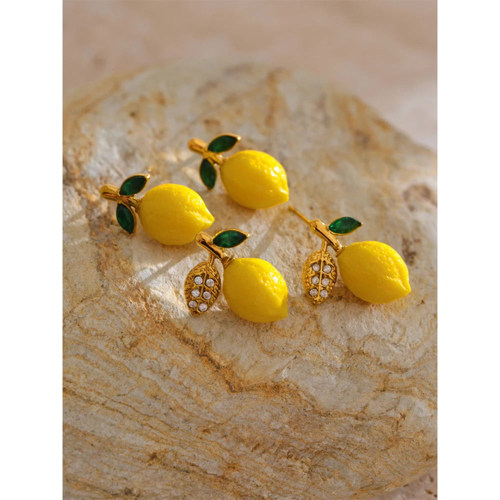 Cubic zirconia resin geometric earrings in gold-plated stainless steel with cubic zirconia and resin.