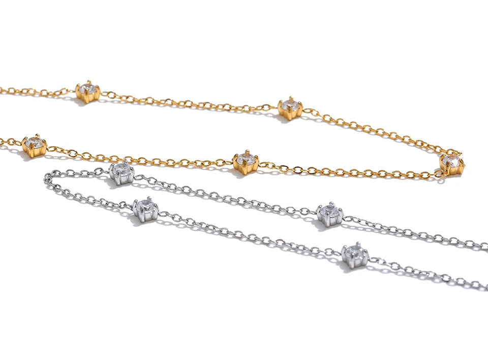 Cubic zirconia geometric necklace in gold-plated stainless steel with cubic zirconia.