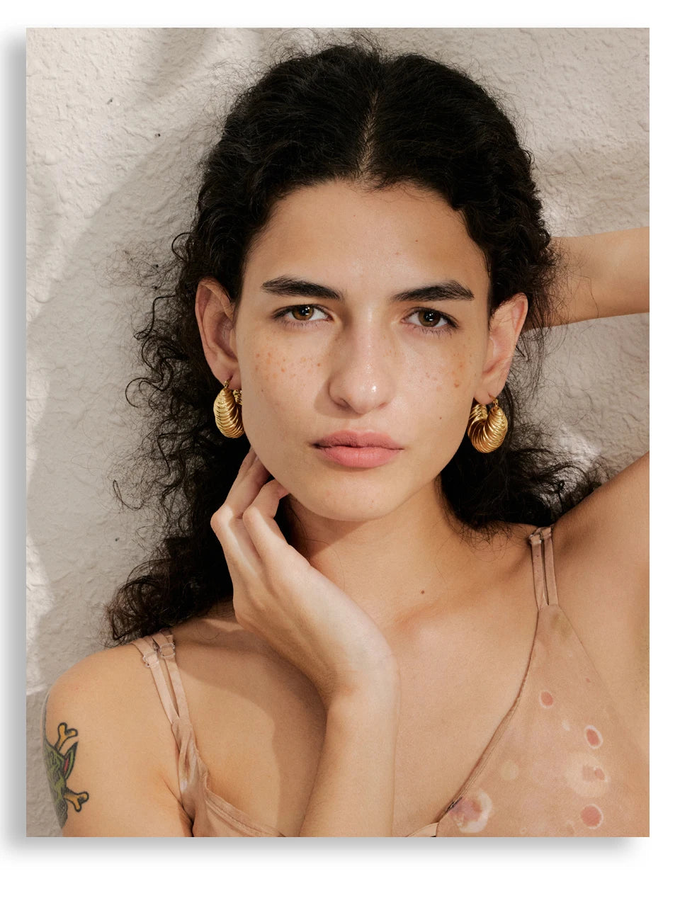 Geometric earrings in gold-plated stainless steel.