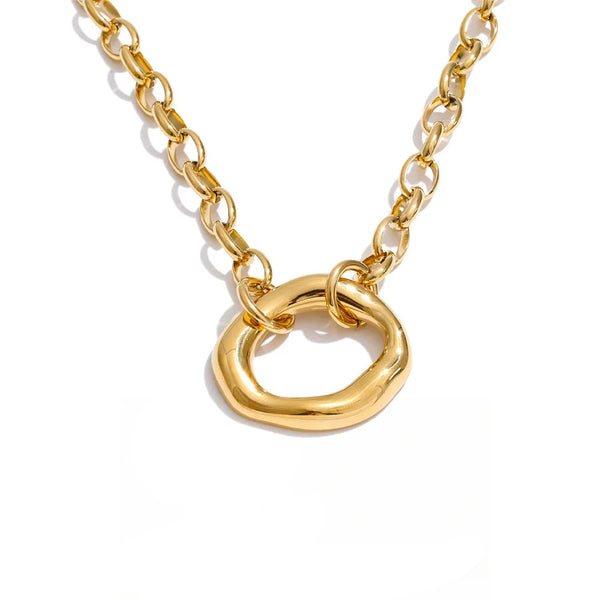 Gold-plated stainless steel necklace with a large ring pendant.