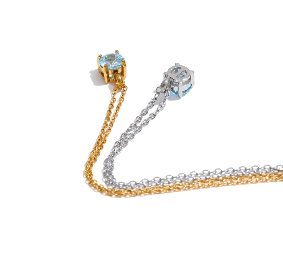Cubic zirconia flower geometric necklace in gold-plated stainless steel with cubic zirconia.