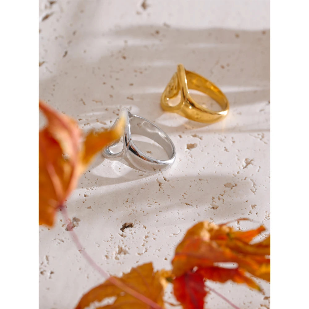 Geometric ring in gold-plated stainless steel.