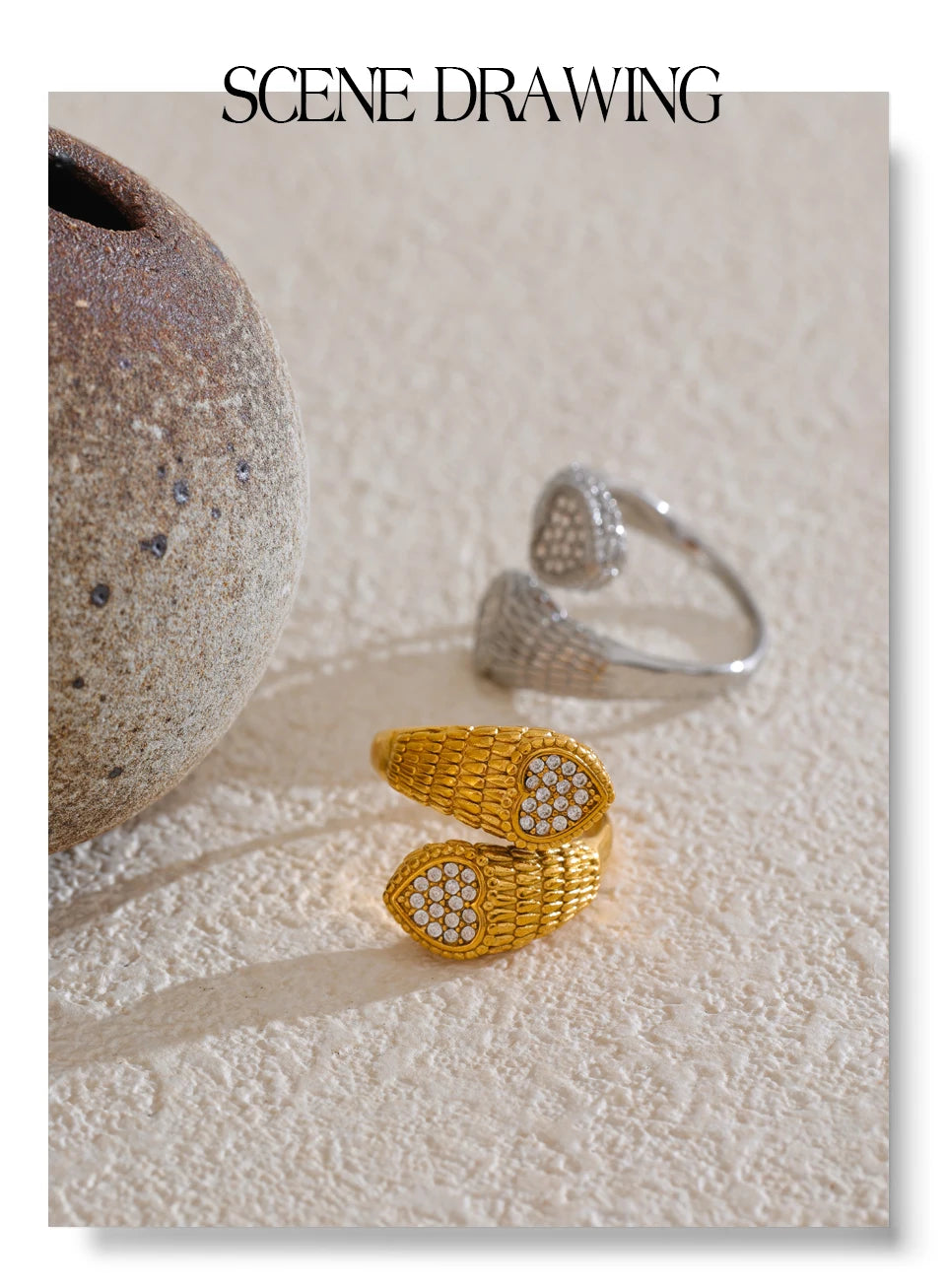 Cubic zirconia heart snake ring in gold-plated stainless steel with cubic zirconia.