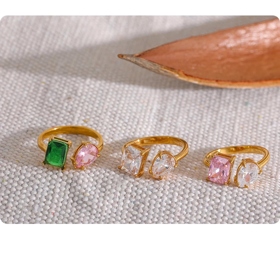 White cubic zirconia geometric ring in 18K gold-plated stainless steel with cubic zirconia.