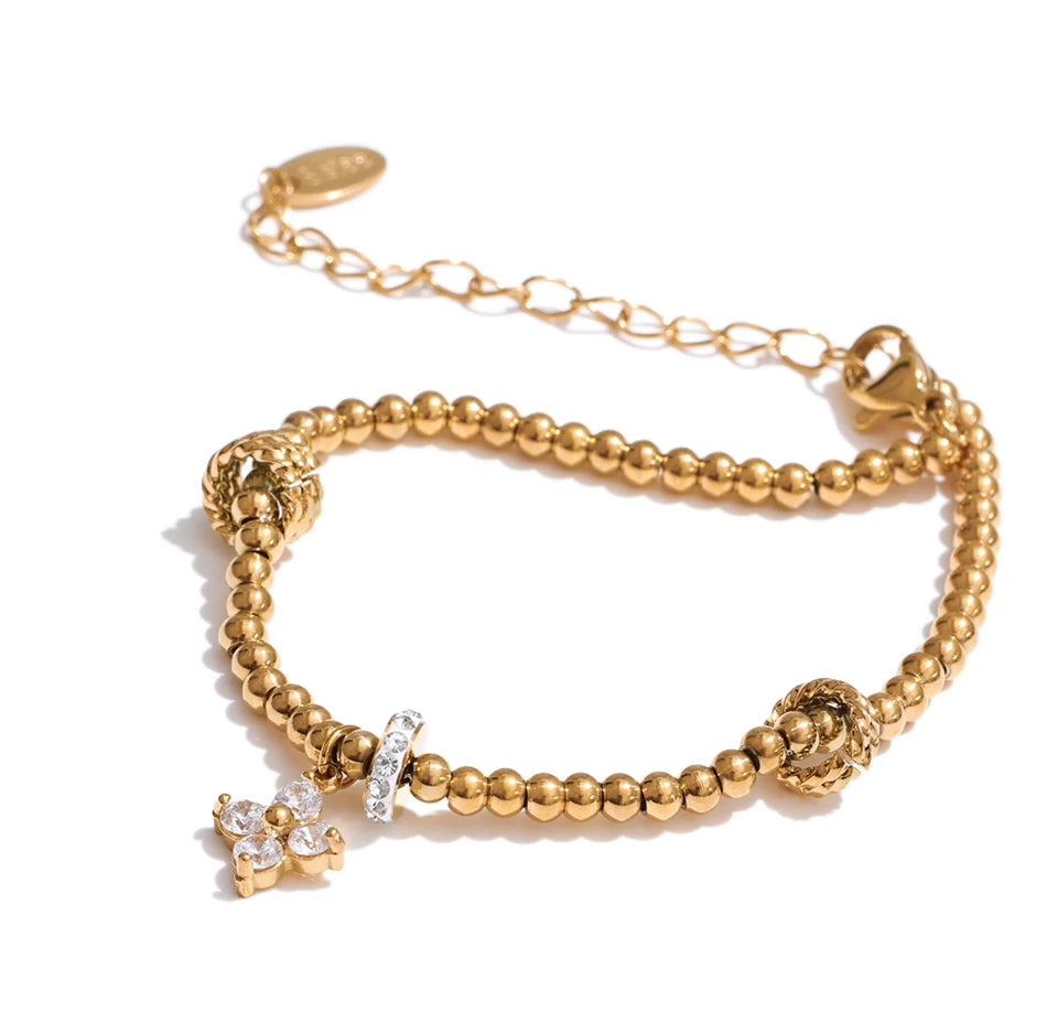Cubic Zirconia Flower Beaded Bracelet — Gold-Plated Stainless Steel with Cubic Zirconia · PS1066
