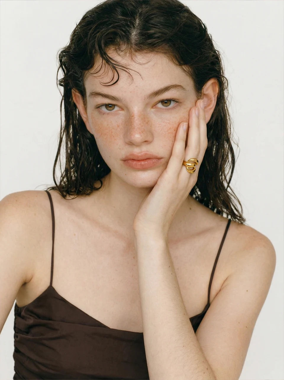 Geometric layered ring in 18K gold-plated stainless steel.