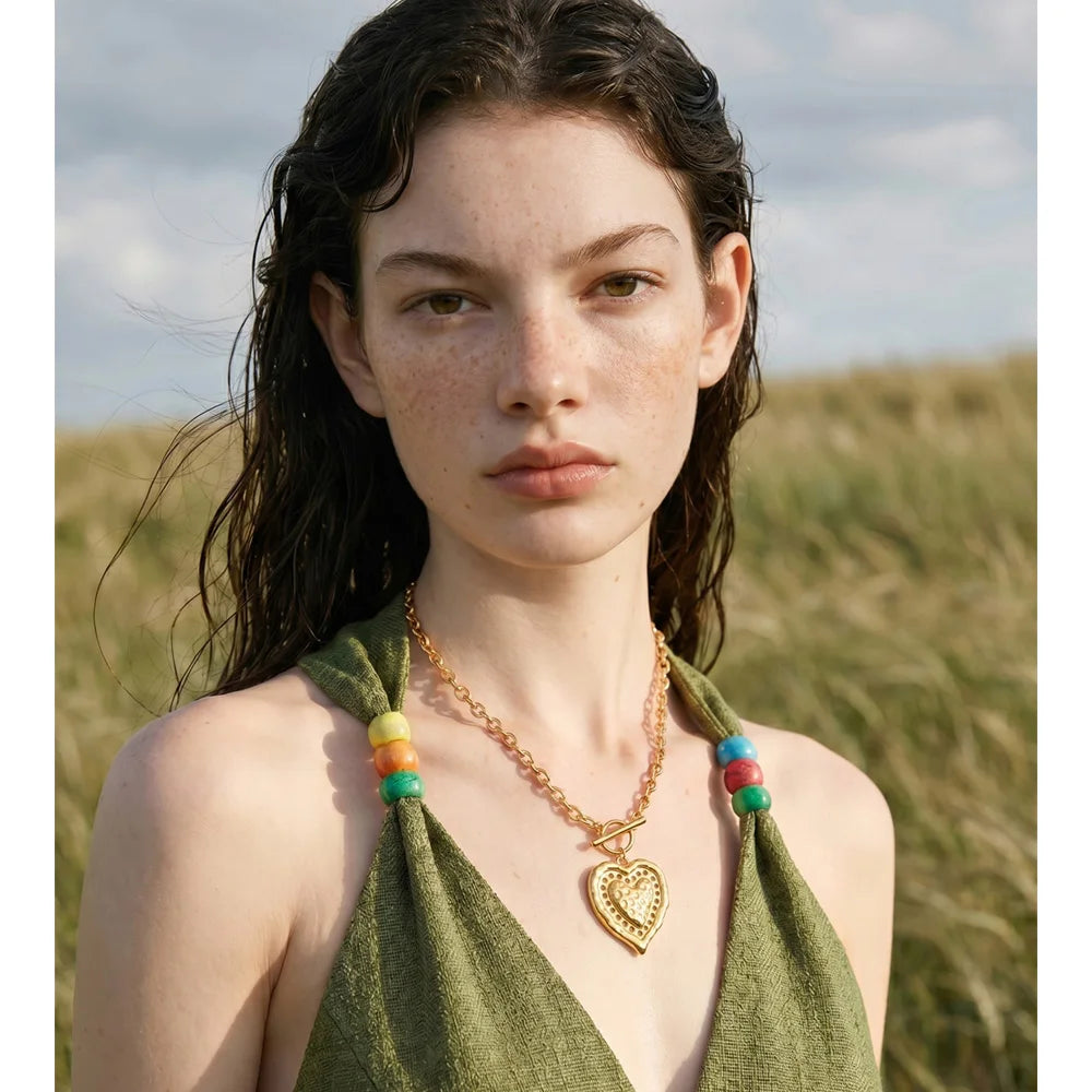 Heart necklace in gold-plated stainless steel.