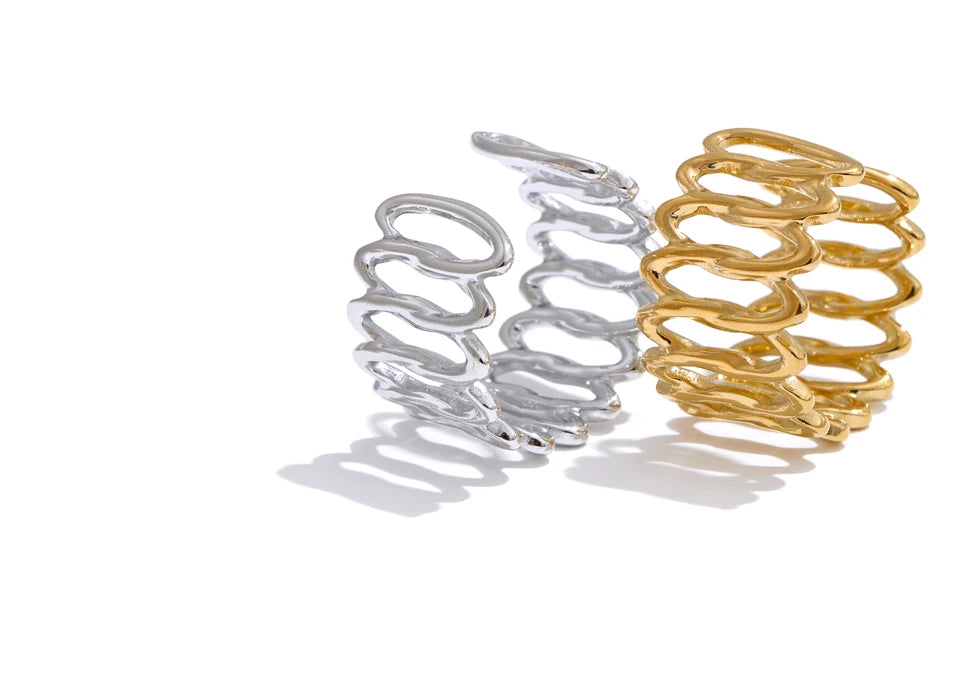 Geometric ring in gold-plated stainless steel.
