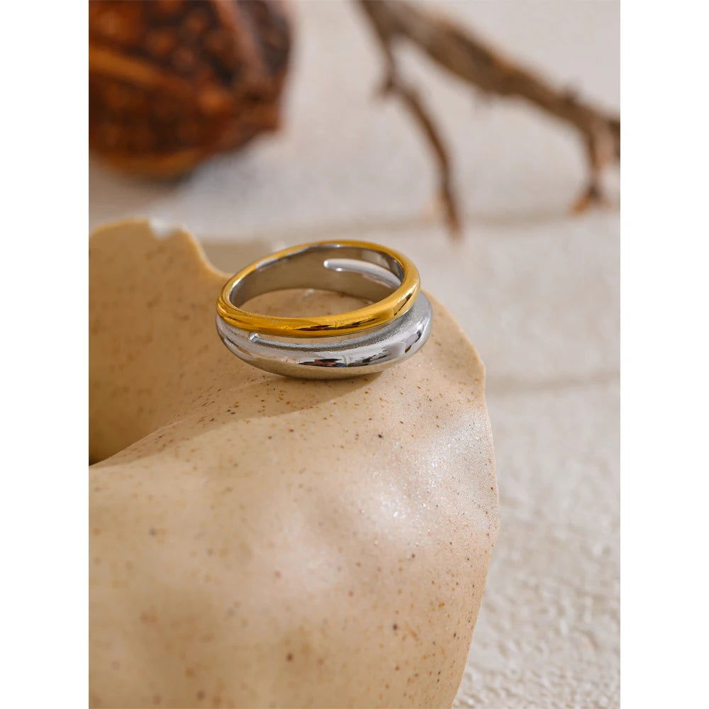 Geometric ring in 18K gold-plated stainless steel.