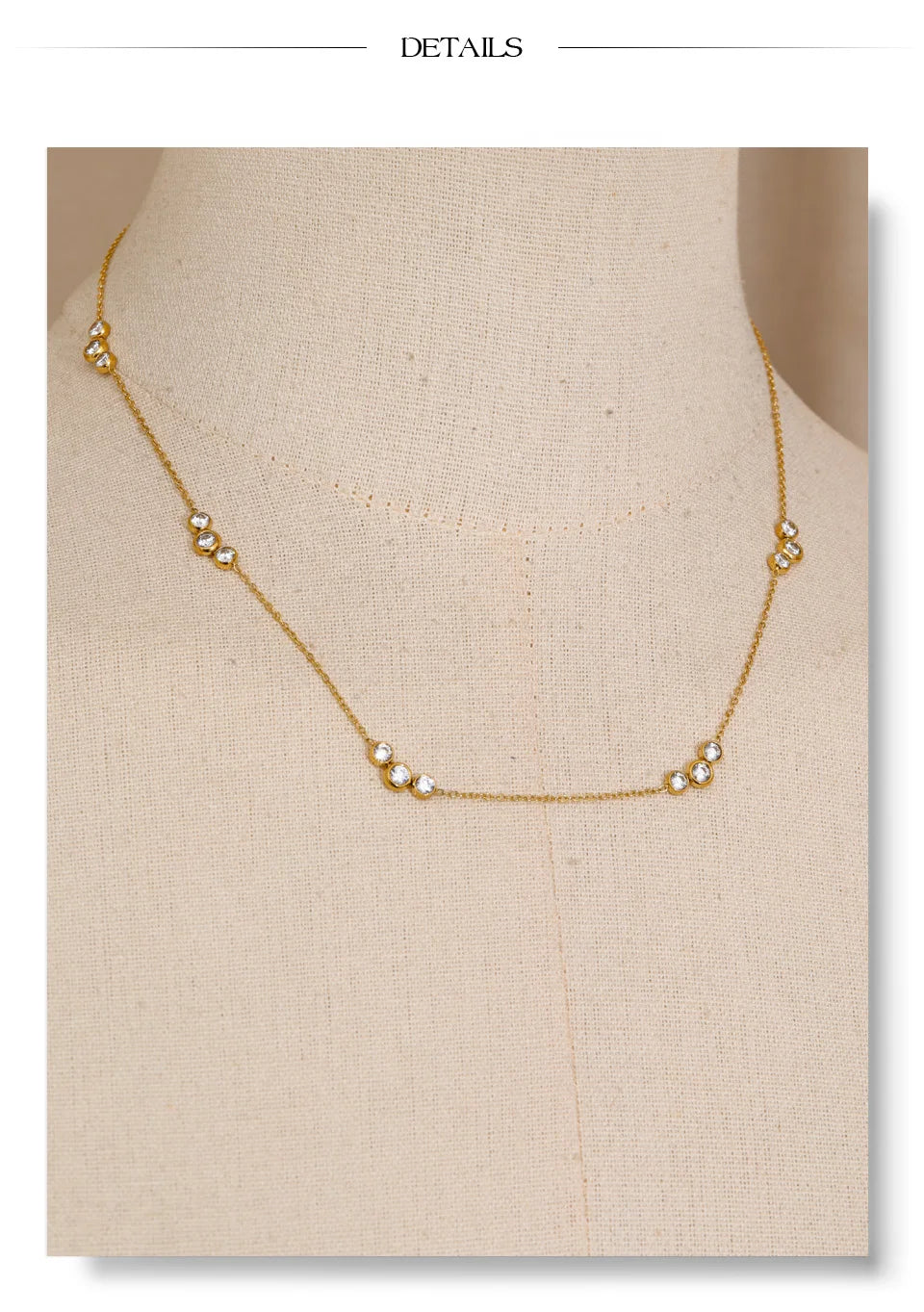 Cubic zirconia geometric chain necklace in gold-plated stainless steel with cubic zirconia.