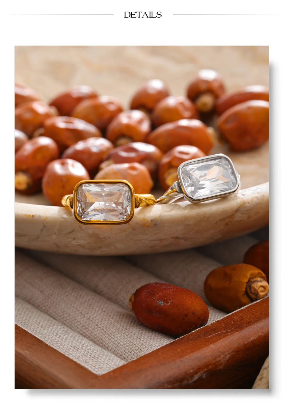 Cubic zirconia geometric ring in 18K gold-plated stainless steel with cubic zirconia.