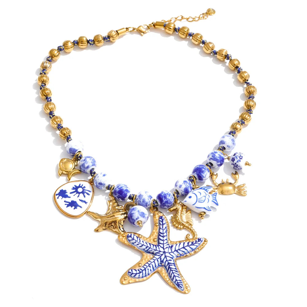 Star beaded geometric necklace in gold-plated stainless steel.
