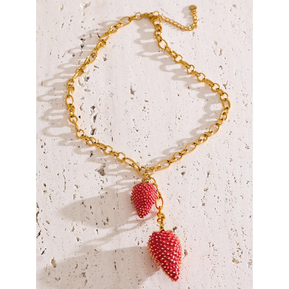 Red heart geometric necklace in gold-plated stainless steel.