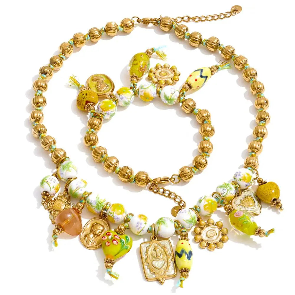 Heart beaded vintage necklace in gold-plated stainless steel.