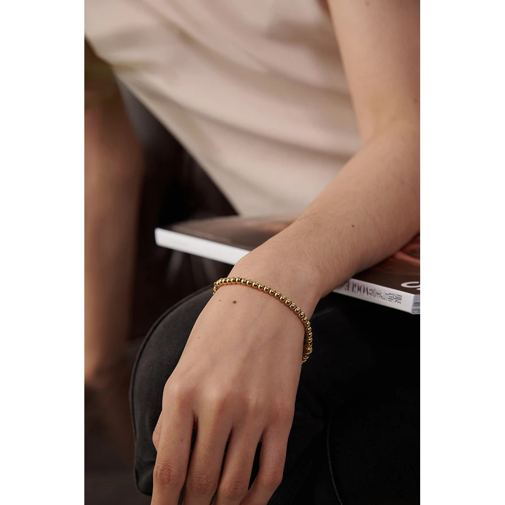 Cubic Zirconia Beaded Geometric Bracelet — Gold-Plated Stainless Steel with Cubic Zirconia · PS1573