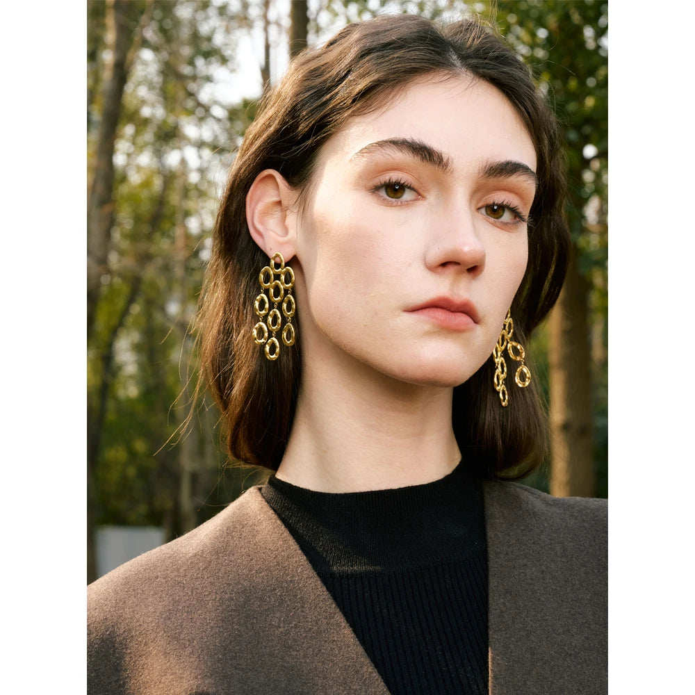 Geometric earrings in gold-plated stainless steel.