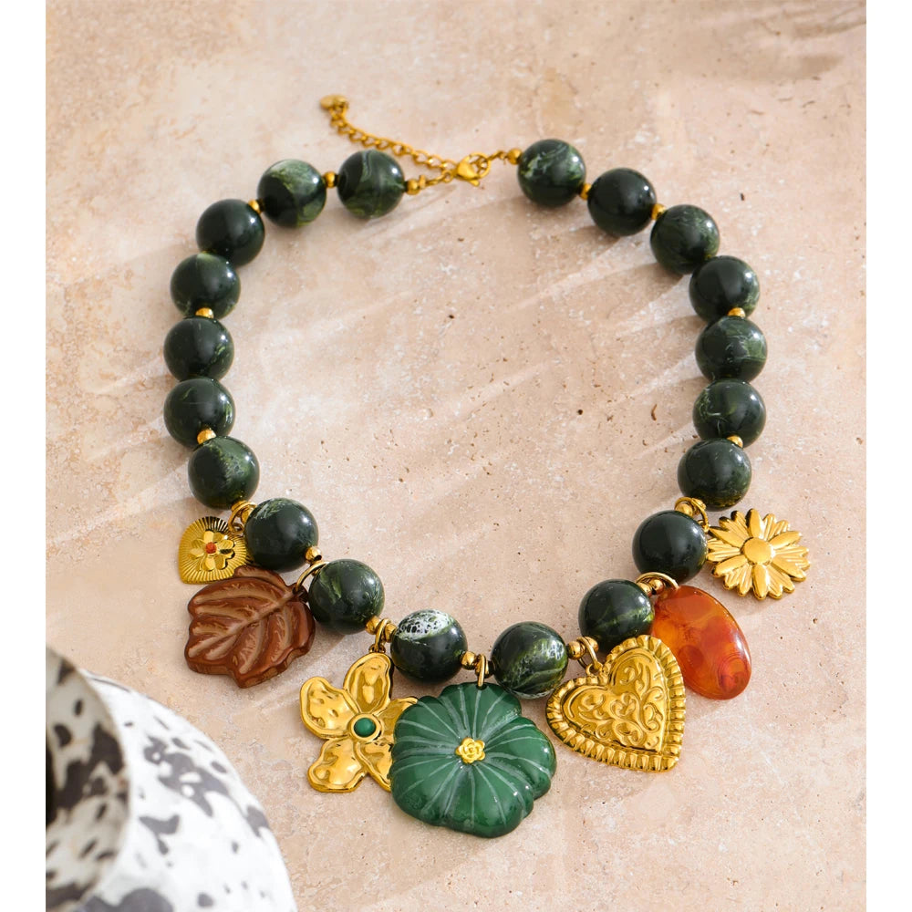 Green resin acrylic necklace in gold-plated stainless steel with resin and acrylic.
