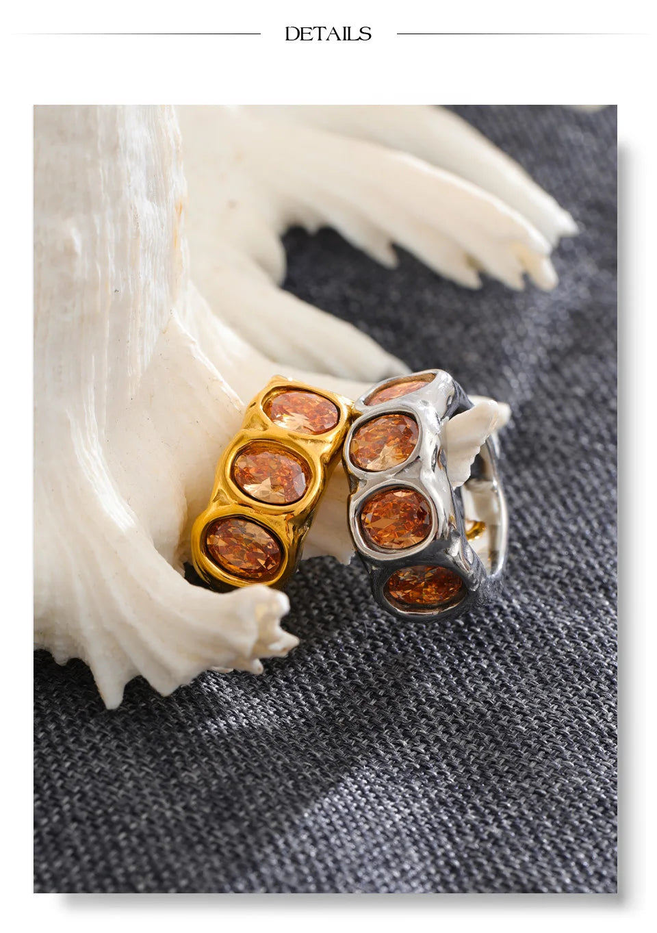 Cubic zirconia geometric ring in 18K gold-plated stainless steel with cubic zirconia.