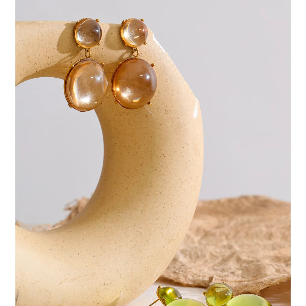 Green resin acrylic earrings in gold-plated stainless steel with resin and acrylic.