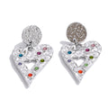 Cubic zirconia heart hammered earrings in gold-plated stainless steel with cubic zirconia.