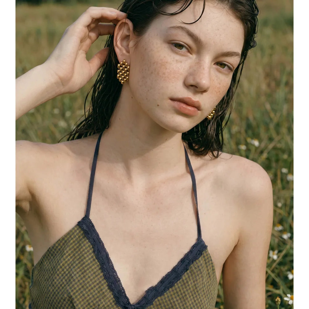 Geometric earrings in gold-plated stainless steel.