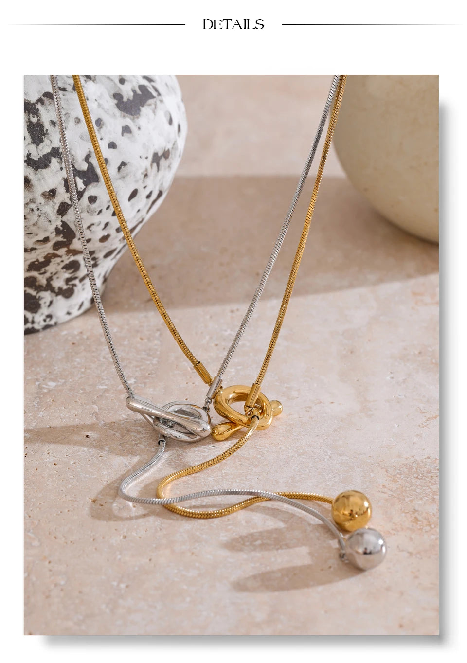 Geometric chain necklace in gold-plated stainless steel.