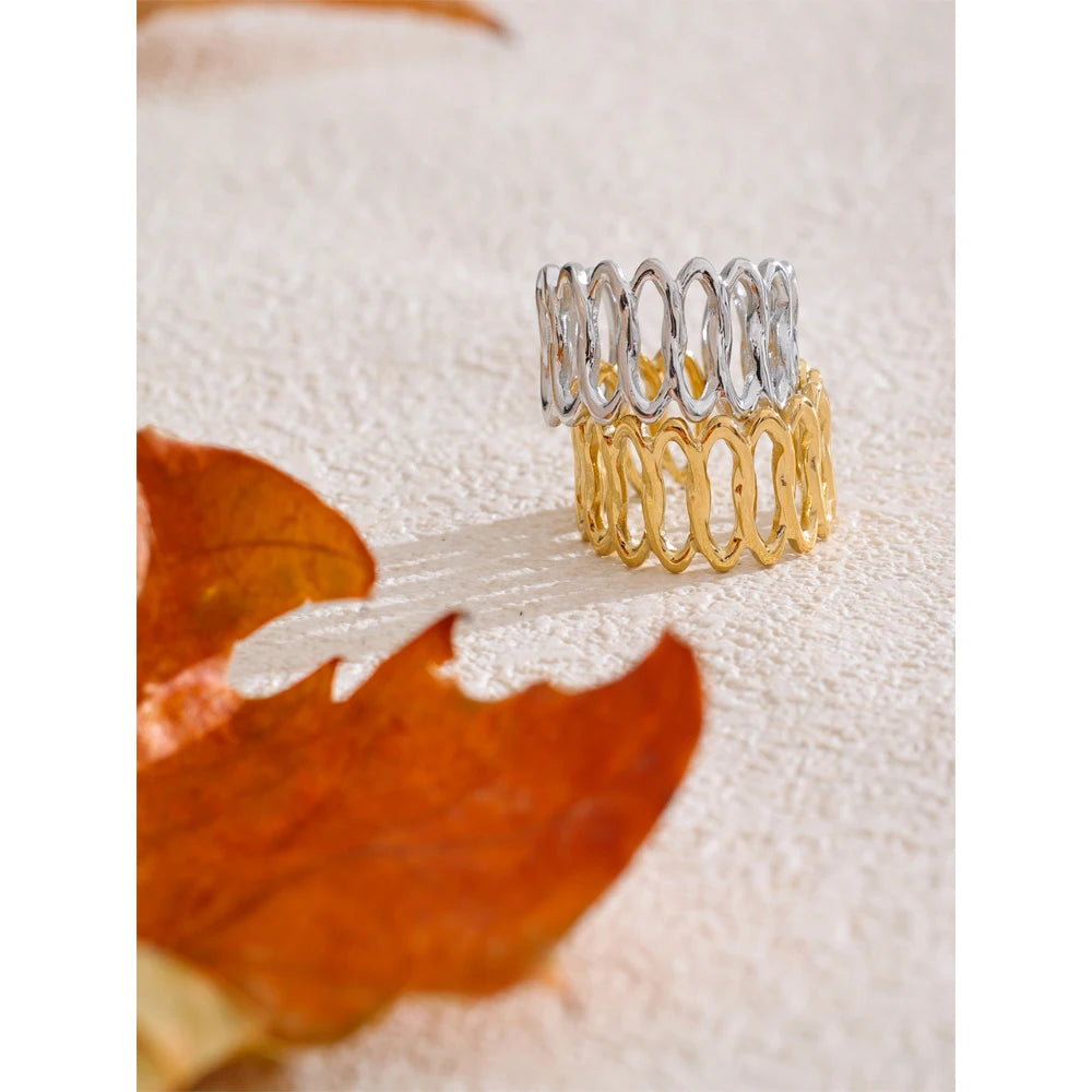 Geometric ring in gold-plated stainless steel.