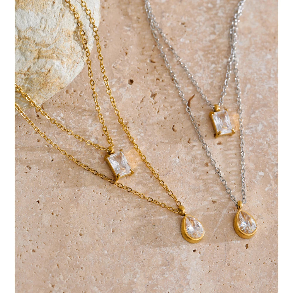 Cubic zirconia geometric layered necklace in gold-plated stainless steel with cubic zirconia.