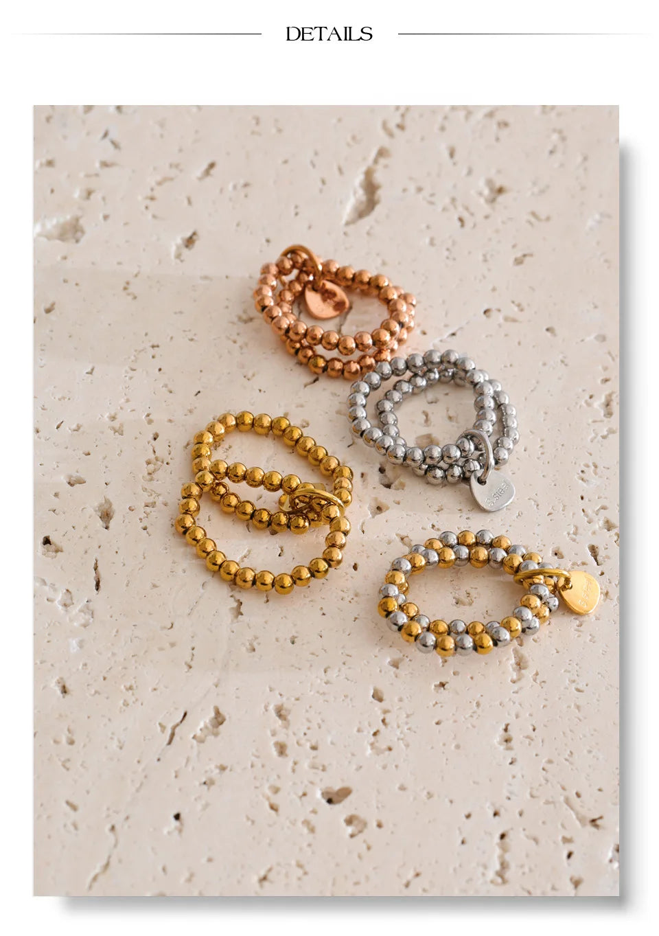 Beaded geometric bracelet in gold-plated stainless steel.