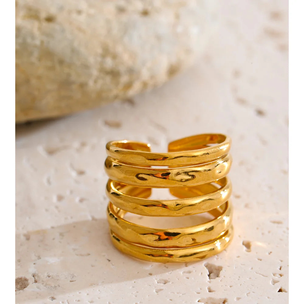 Geometric layered ring in 18K gold-plated stainless steel.