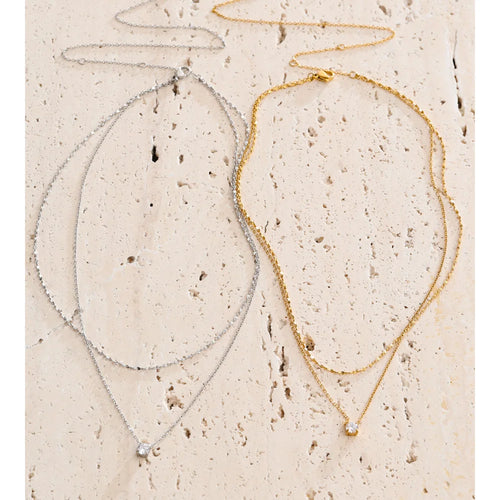 Cubic zirconia geometric chain necklace in gold-plated stainless steel with cubic zirconia.